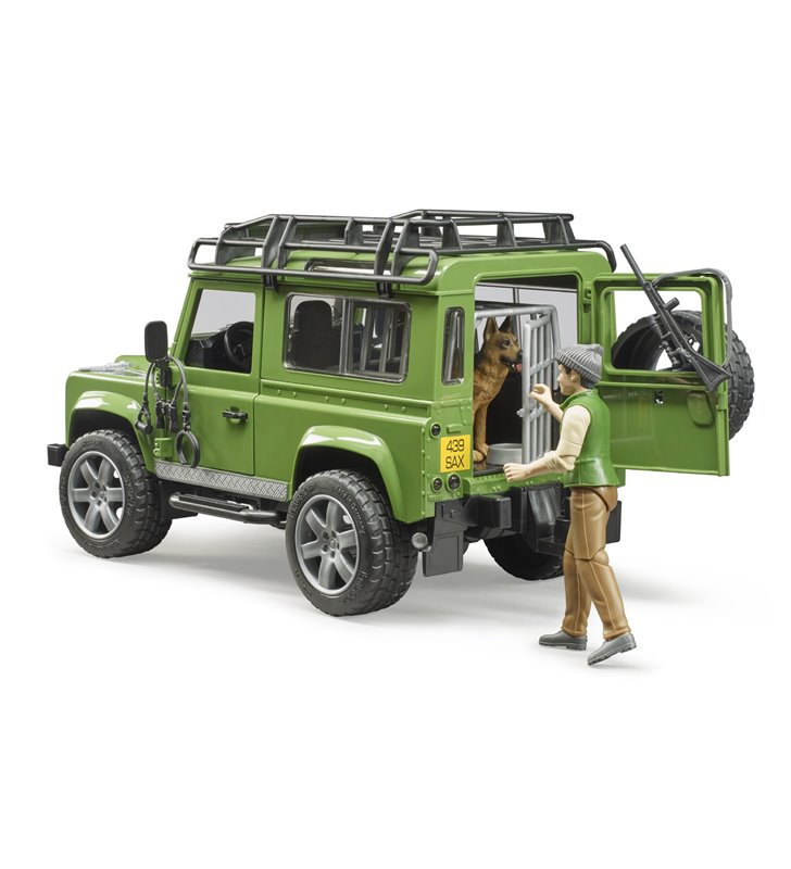 Land Rover Defender z figurką leśnika i z psem Bruder 02587