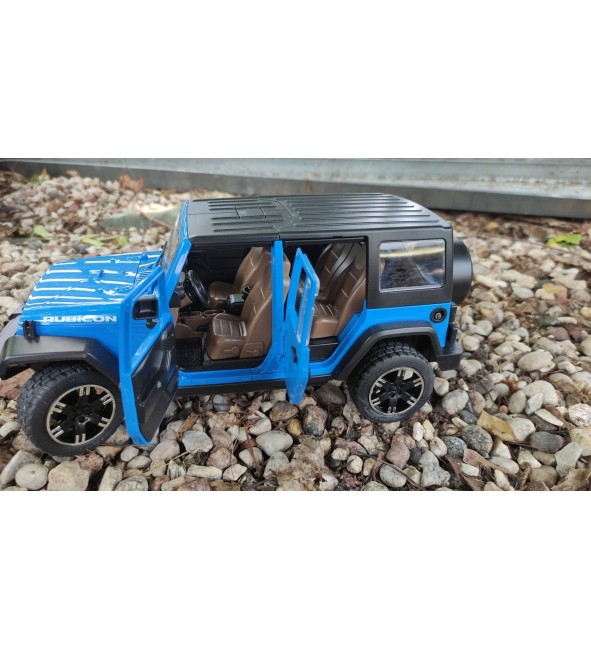 Jeep Wrangler Unlimited Rubicon z kajakiem i figurką kajakarza Bruder 02529