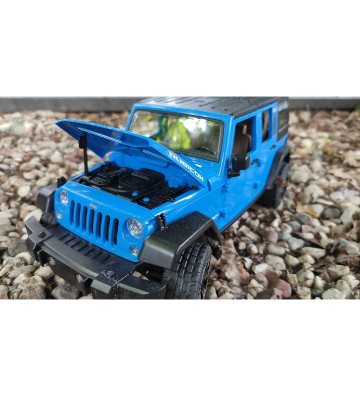 Jeep Wrangler Unlimited Rubicon z kajakiem i figurką kajakarza Bruder 02529